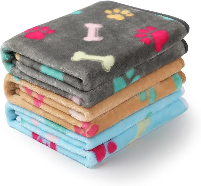 3-pack pet fleece blankets with paw prints and bone motifs, folded stack