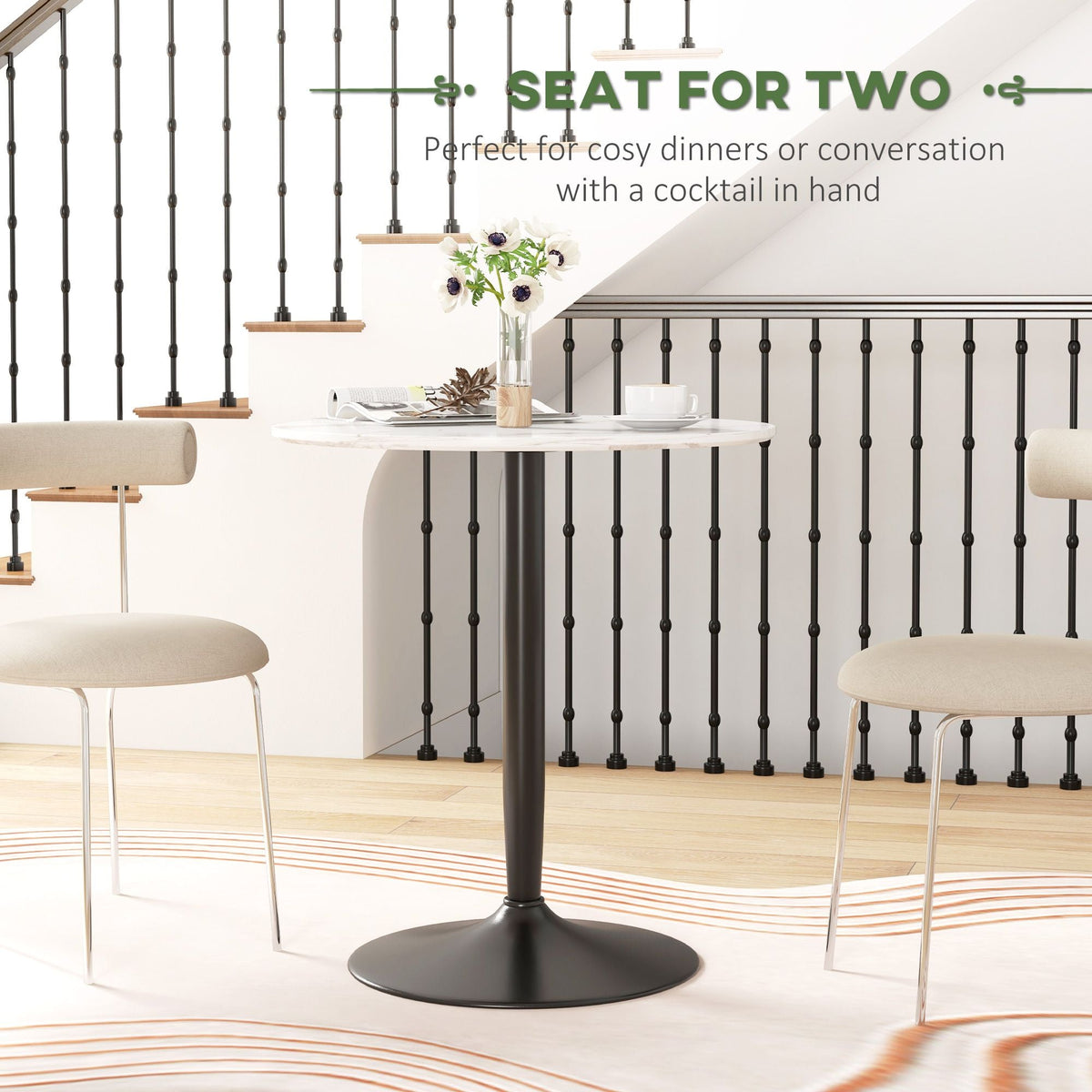 Round white marble dining table for two with black steel pedestal base