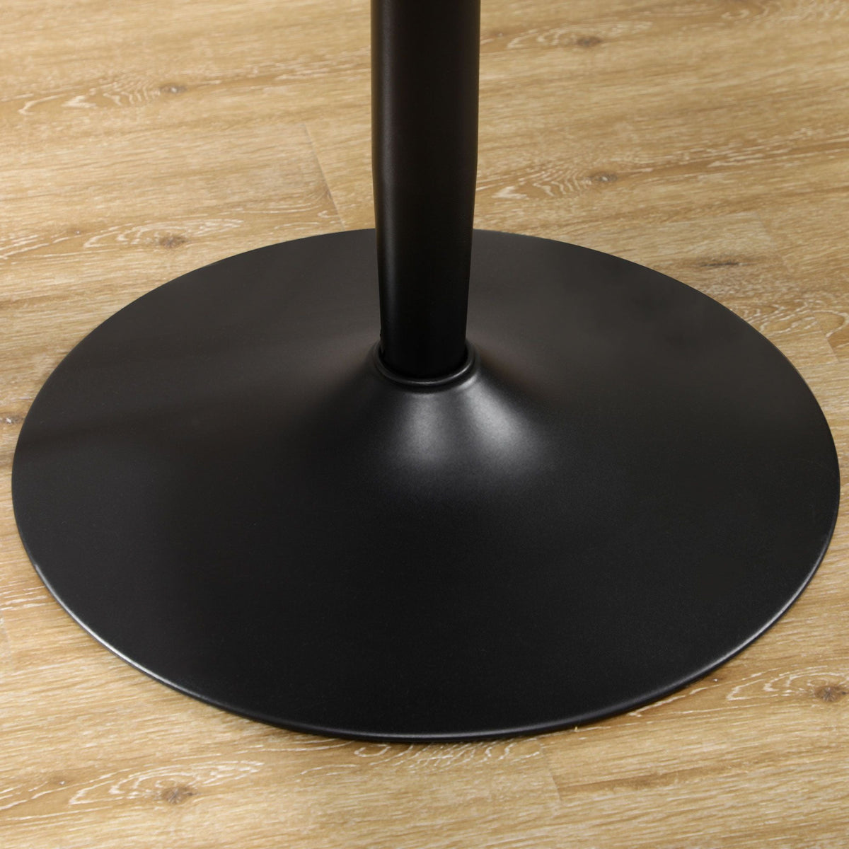 Black steel pedestal base for round dining table with smooth matte finish