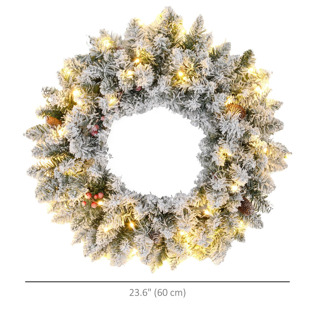 24-inch snow-flocked wreath with warm white LED lights, pinecones and berry clusters