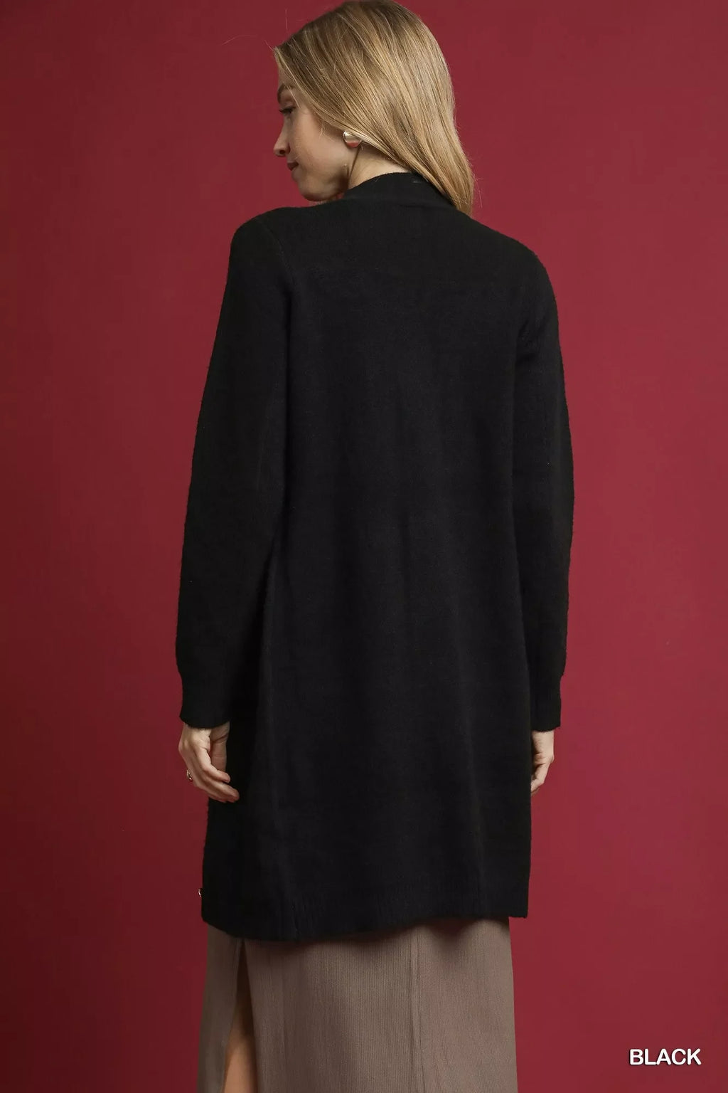 Black longline sweater cardigan with button-front, full back view