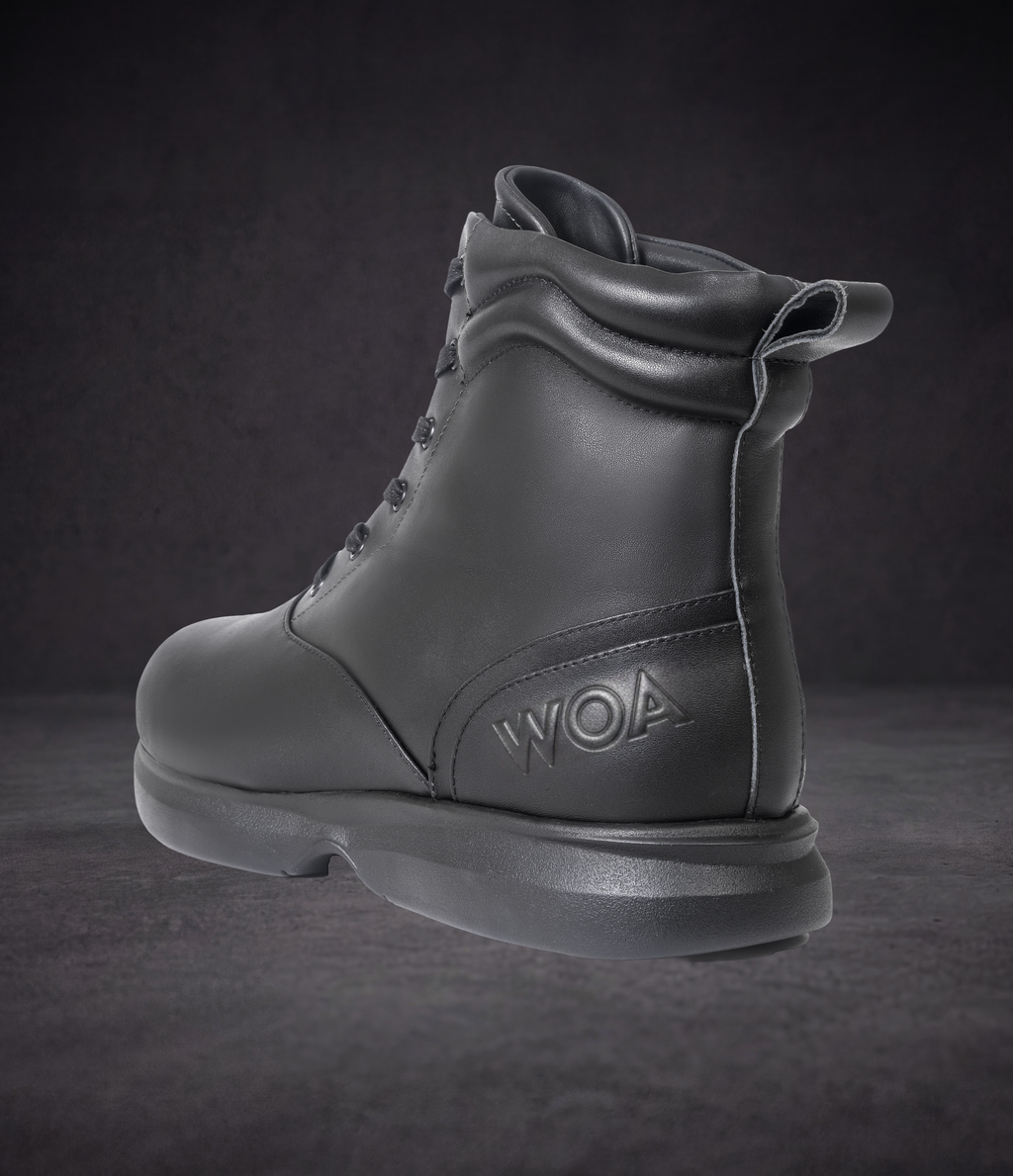 WOA lace-up ankle boot with rear pull tab, padded collar, and WOA side logo