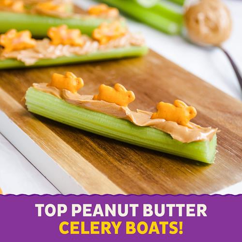 Celery snack boats topped with cheesy crackers