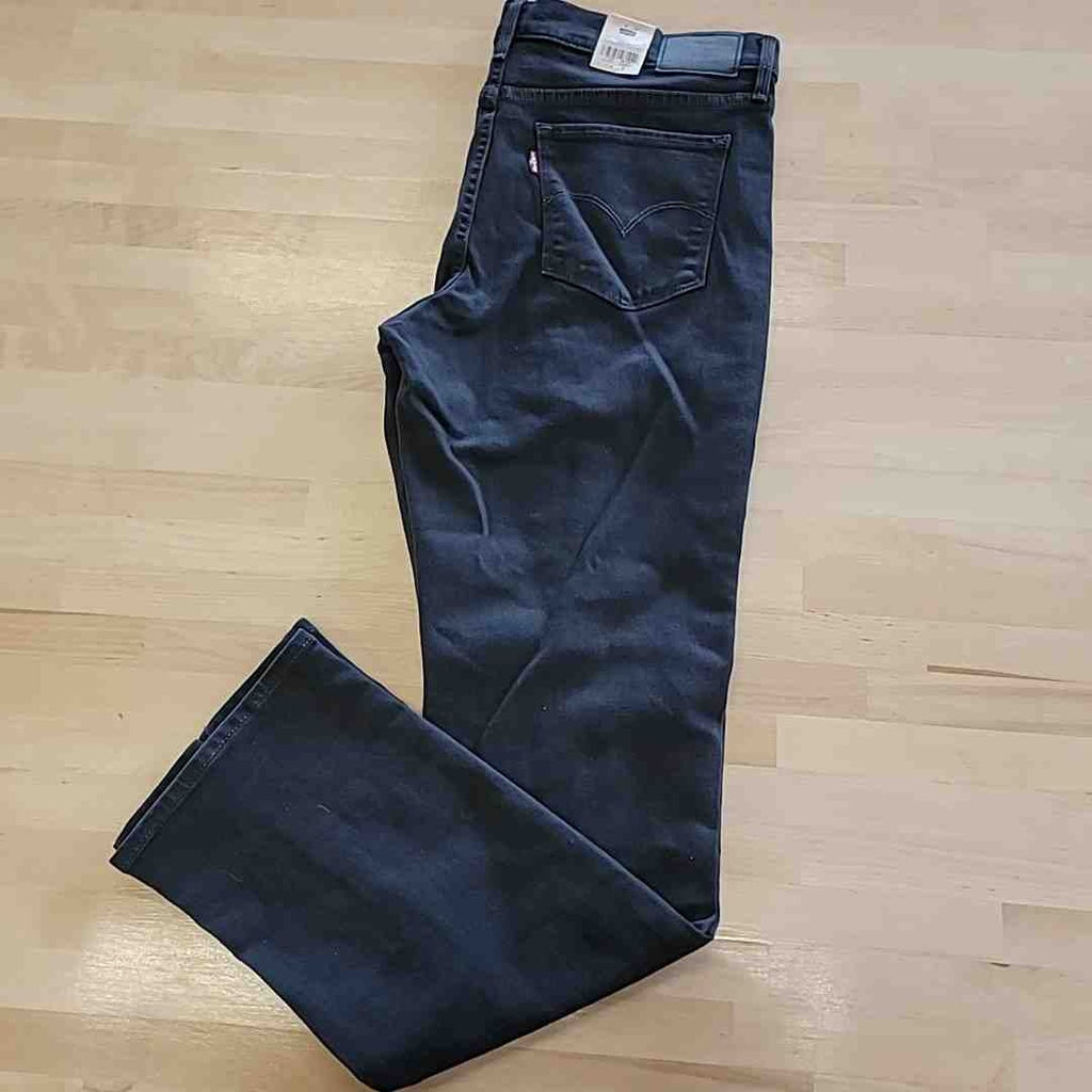 Dark blue straight-leg jeans, back view with patch pocket and belt loops