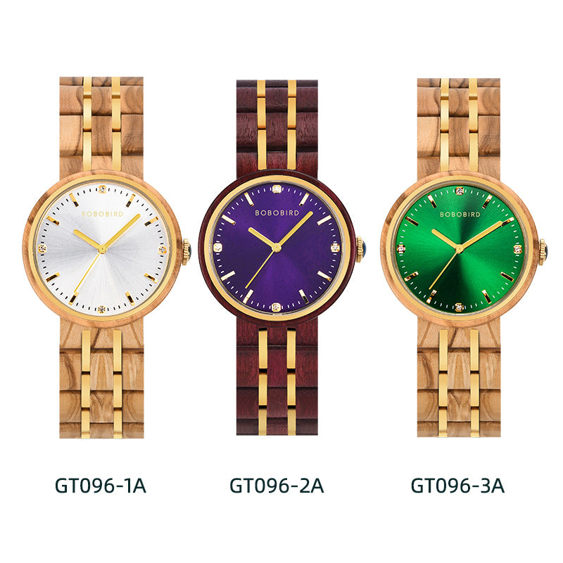 Three womens quartz watches shown side by side: white, purple, and green dials with link straps