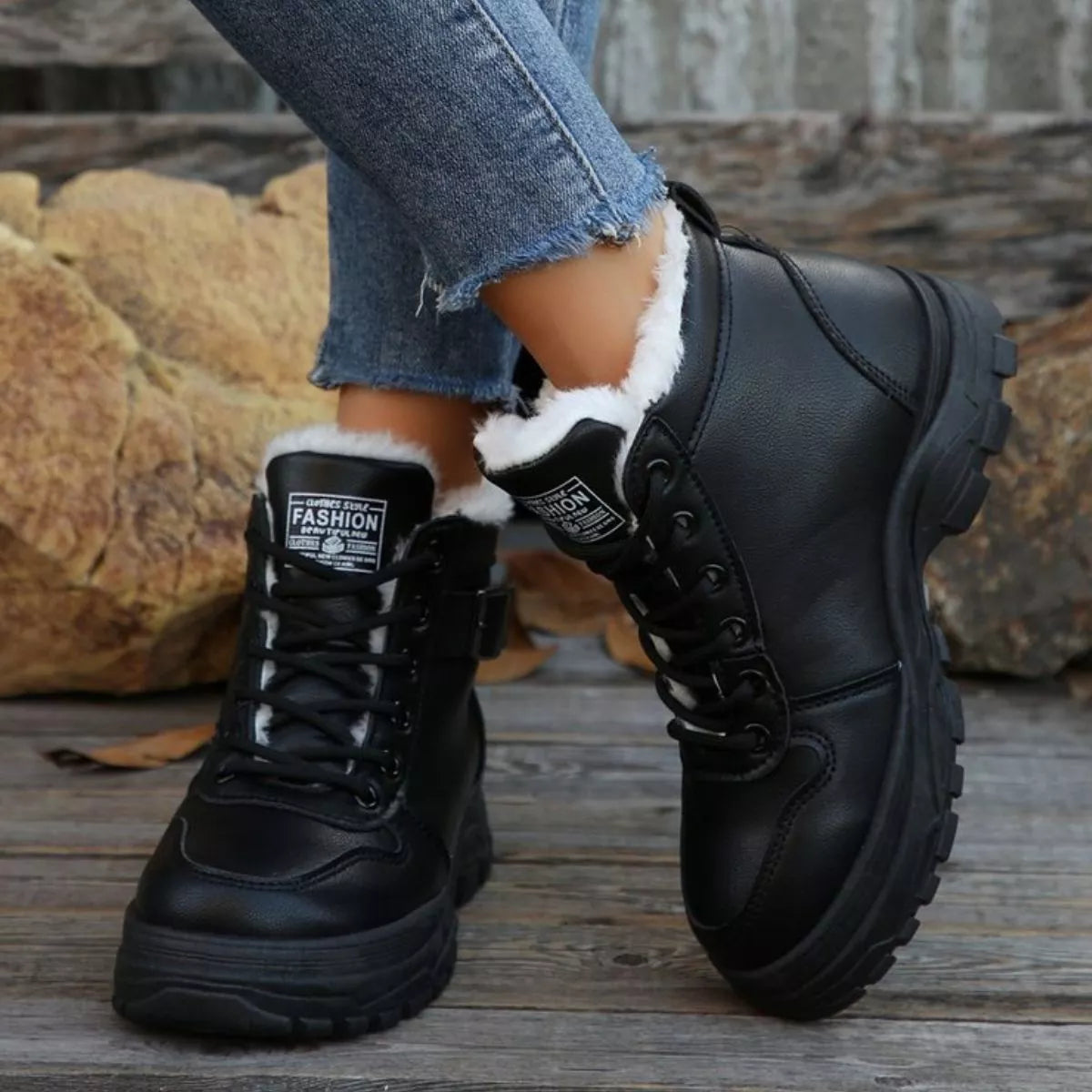 Black warm-lined ankle boots with lace-up front and fleece trim around collar