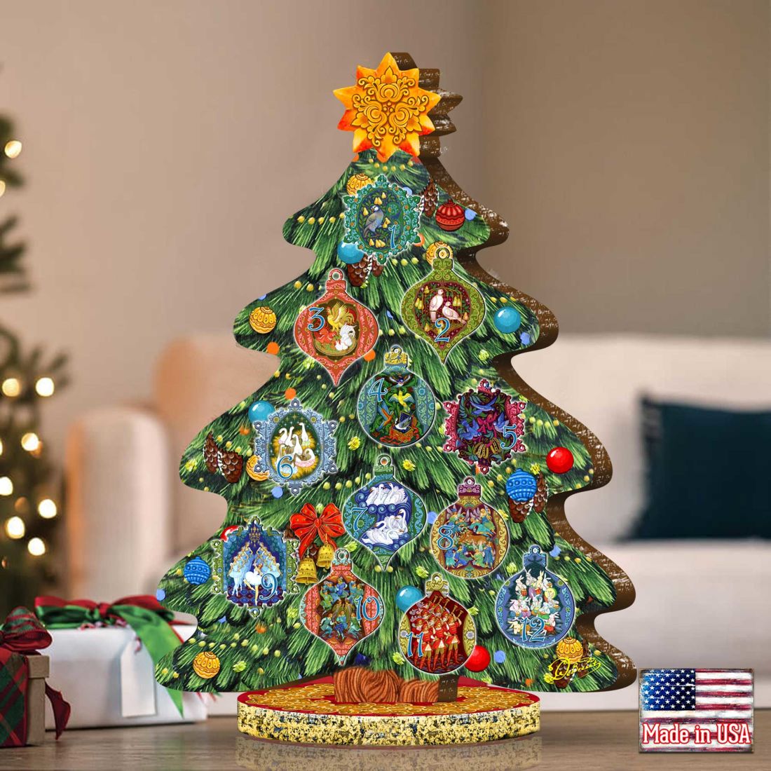Decorated wooden tree centerpiece figurine with colorful ornaments and gold star topper