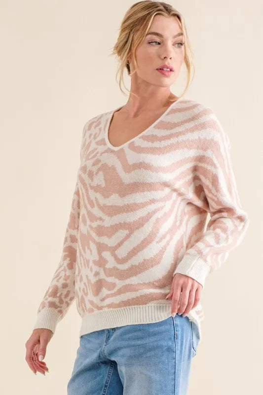 Pale pink long-sleeve V-neck knit sweater top with mixed animal print