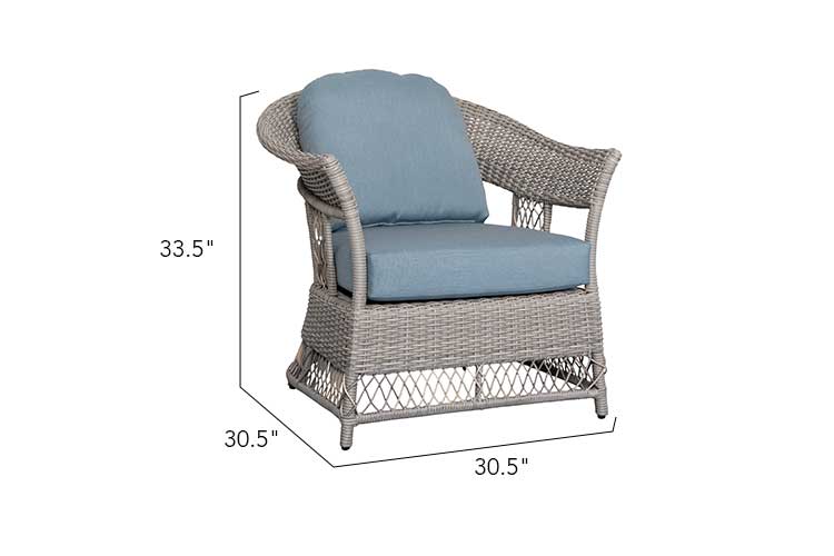 Wicker lounge chair with light blue cushions, shown with overall dimensions