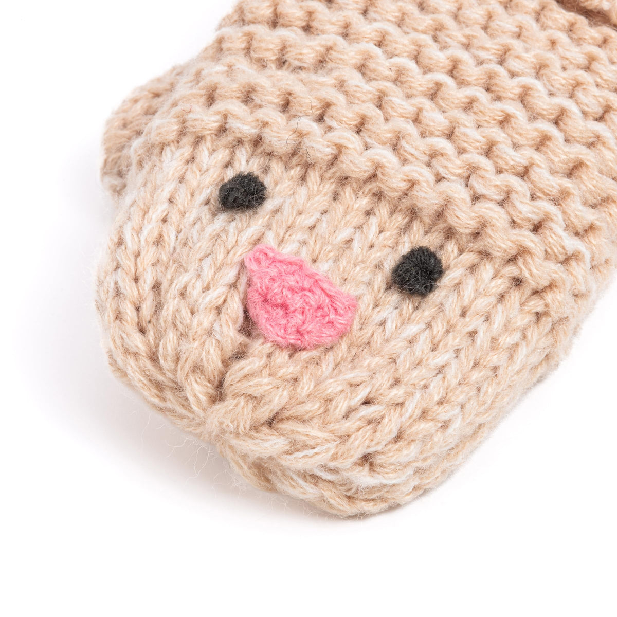 Close-up natural taupe knit chick mitten with pink beak, black eyes, and textured knit.