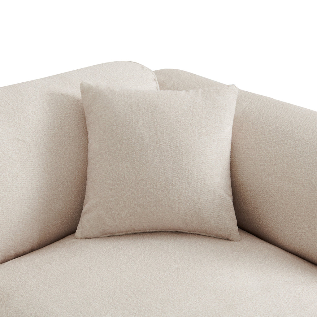 Close-up of light beige upholstered backrest with square throw pillow