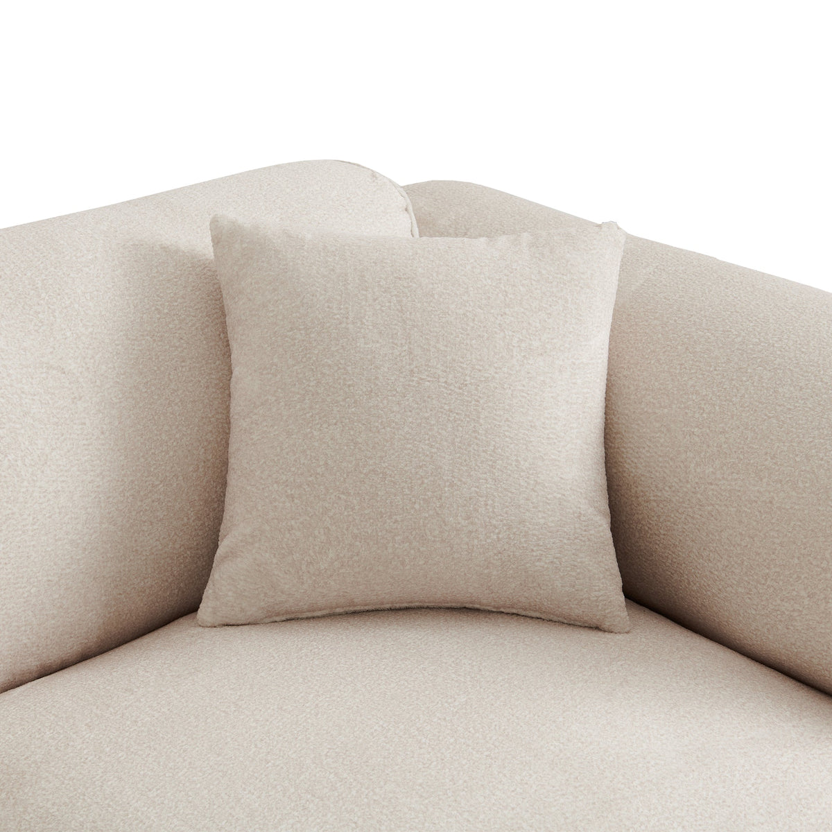 Close-up of light beige upholstered backrest with square throw pillow