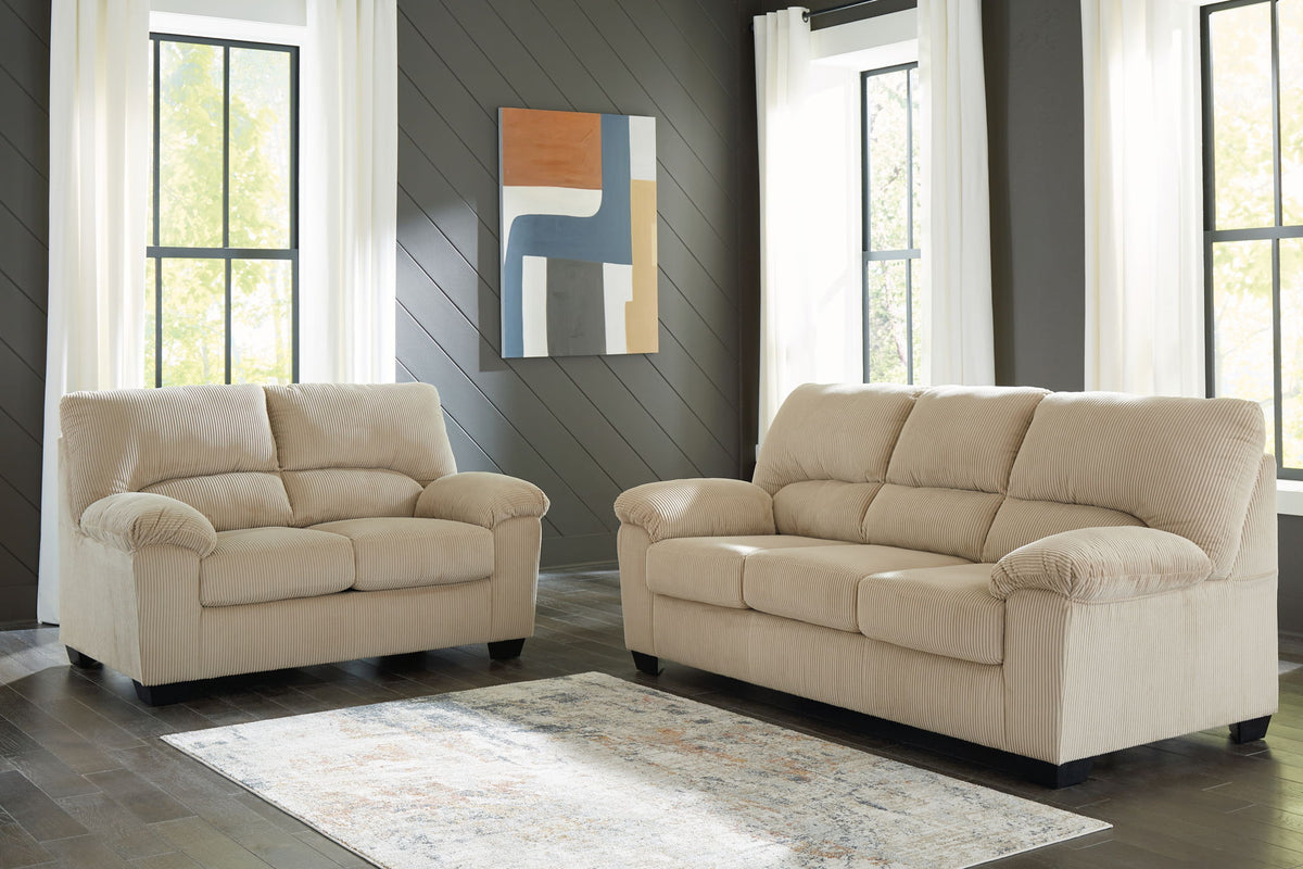 Beige living room sofa and loveseat set with rolled arms