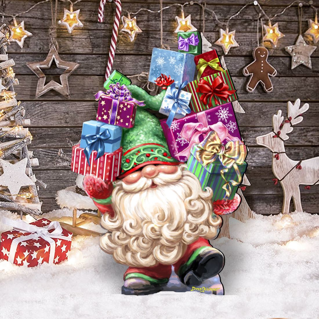 Holiday gnome yard decor holding gift boxes and ornaments, standing on snowy ground