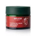 Weleda plumping day cream jar with green lid and red label