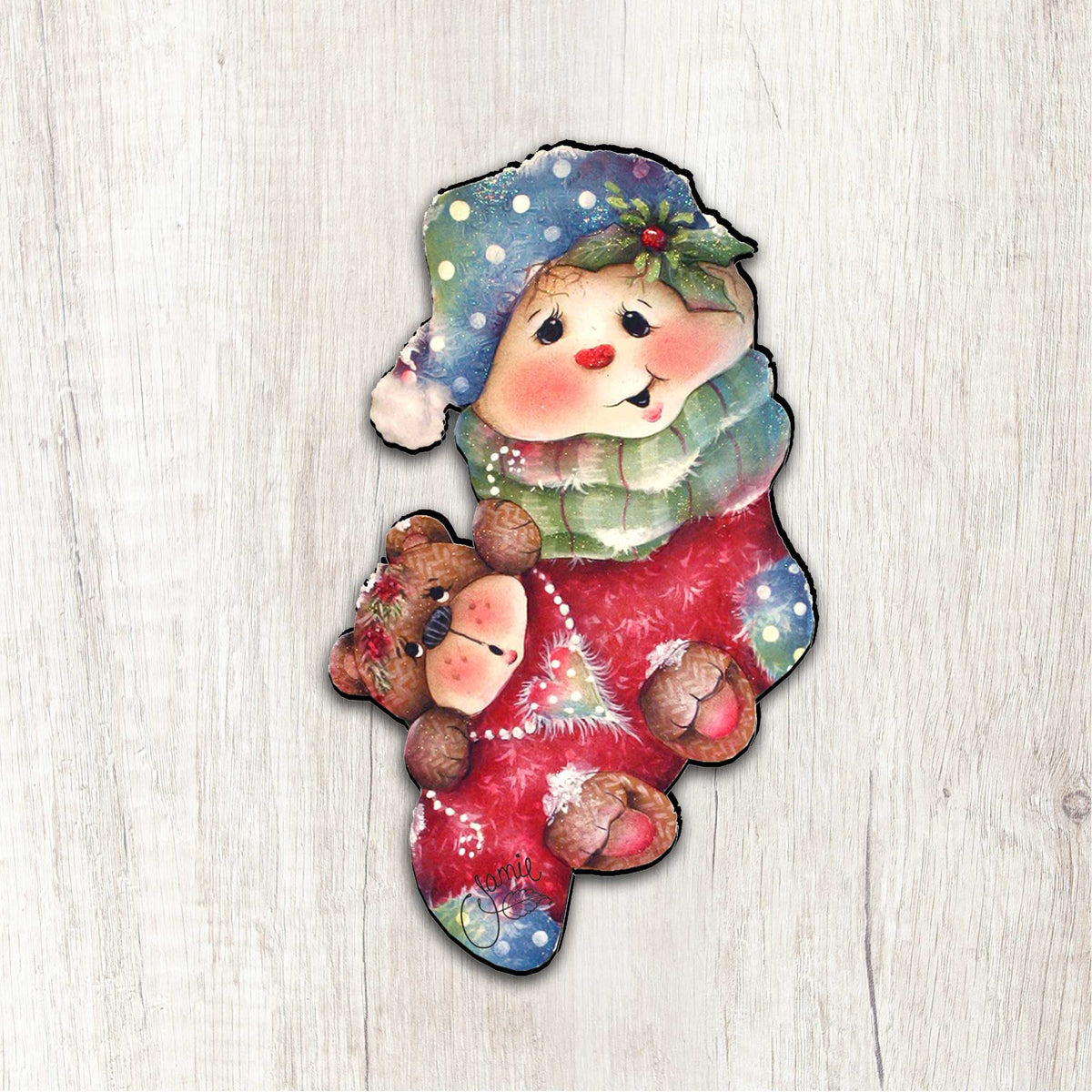 Christmas bear-themed door decor featuring a smiling character in red and green