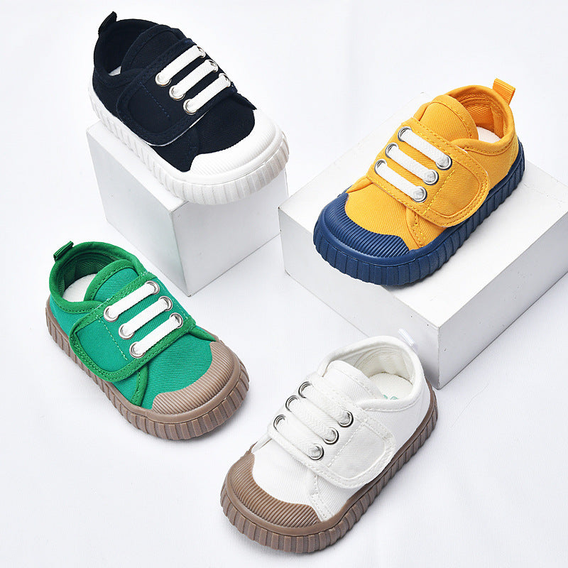 Baby first-walker sneakers set in yellow, green, black, and white