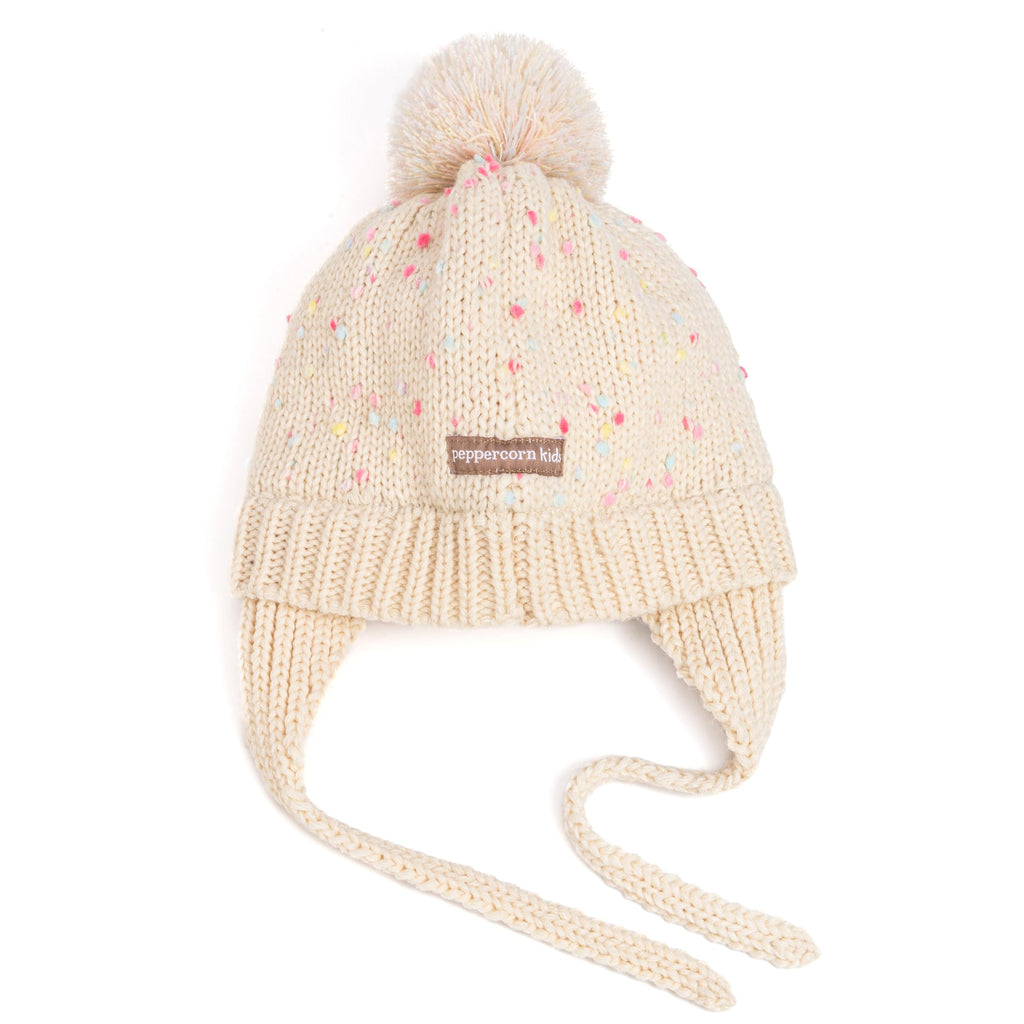 Off-white speckled knit earflap beanie with pom-pom and tie strings, toddler size.