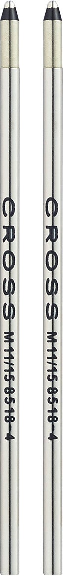 Close-up pair of mini ballpoint pen refills, silver barrels, black medium ink tips