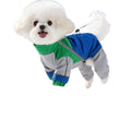 Blue and green waterproof dog jumpsuit with reflective side trim and elastic hem