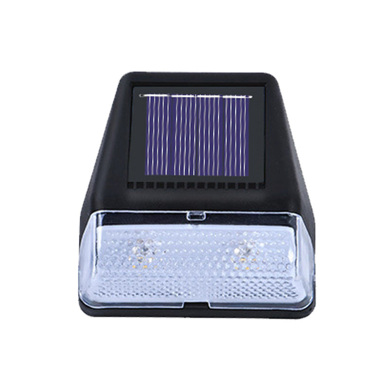 Black solar LED wall lamp with solar panel and clear lens light cover