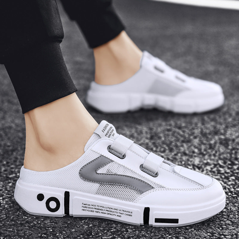 White mesh half slippers on feet, closed toe, dual buckle straps, thick sole