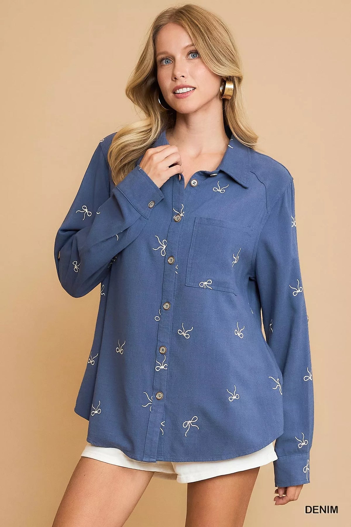 Denim blue fitted button-up shirt with ribbon bow embroidery, long sleeves