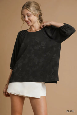 Black jacquard balloon-sleeve blouse with round neckline and loose fit
