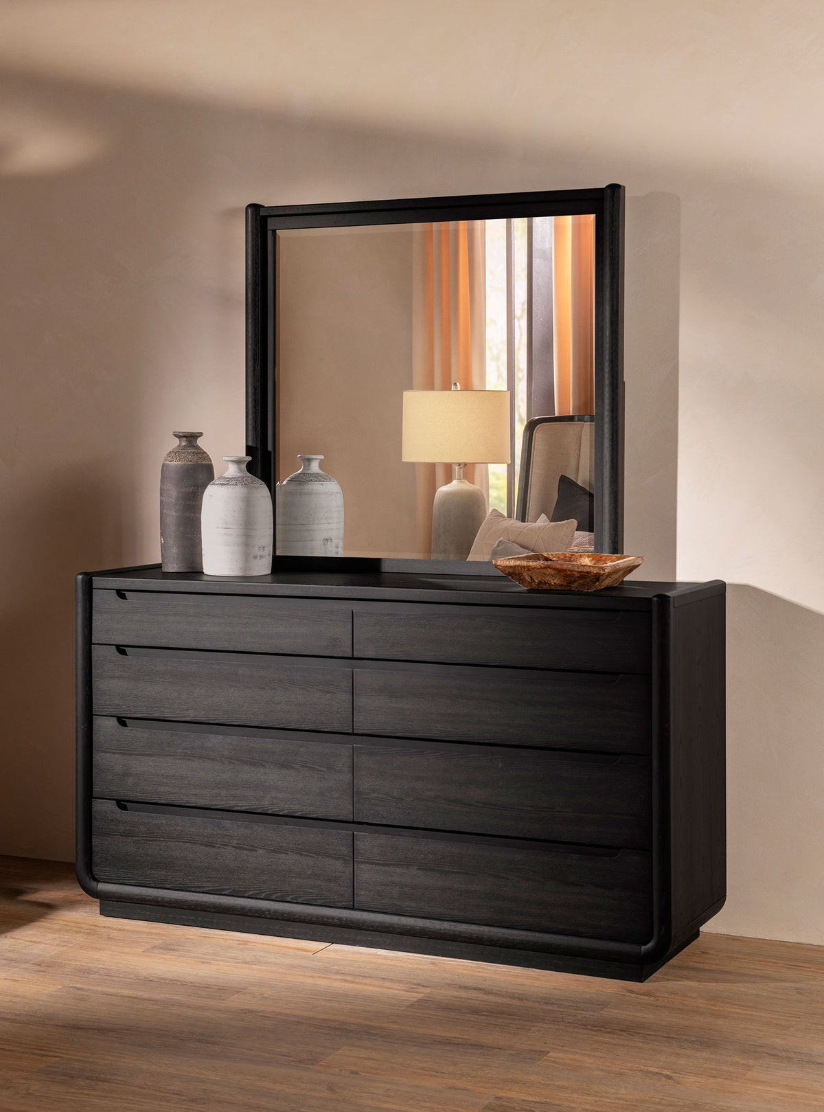 Black 8-drawer bedroom dresser with rectangular mirror and horizontal drawer lines