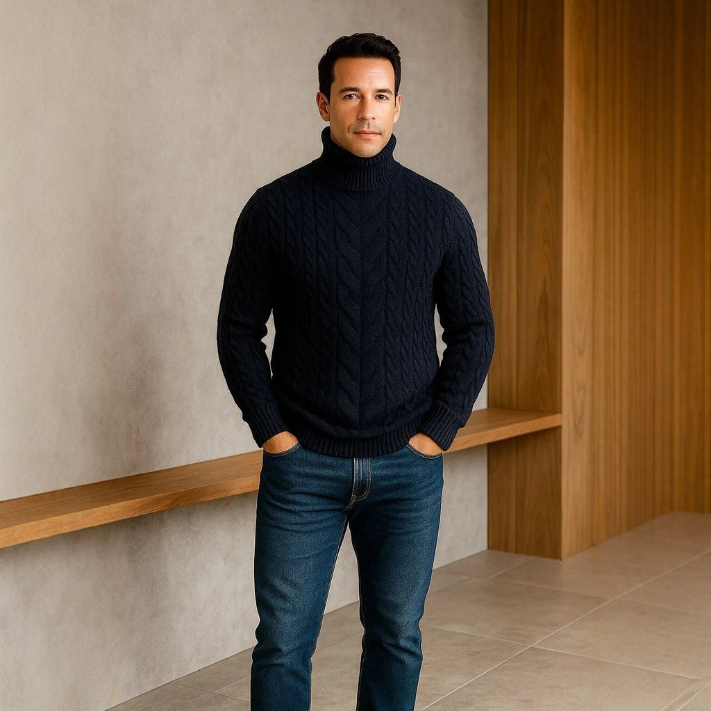 Men's cable-knit turtleneck sweater in navy blue, long sleeves, textured cable pattern.