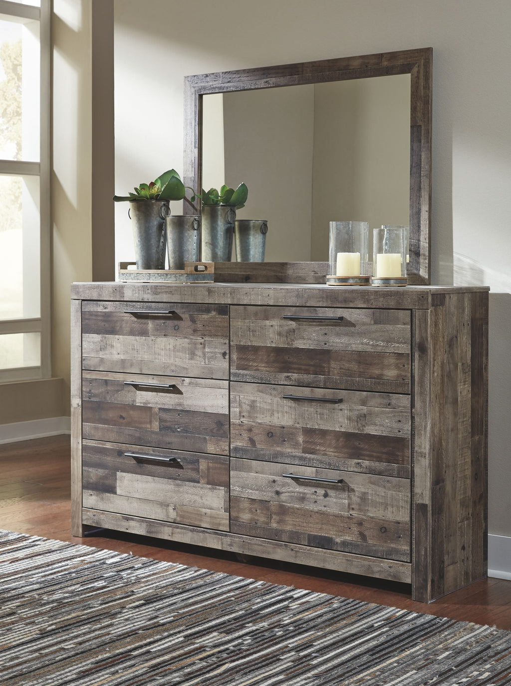 Youth dresser with multi-drawer storage and tall mirror, distressed wood finish