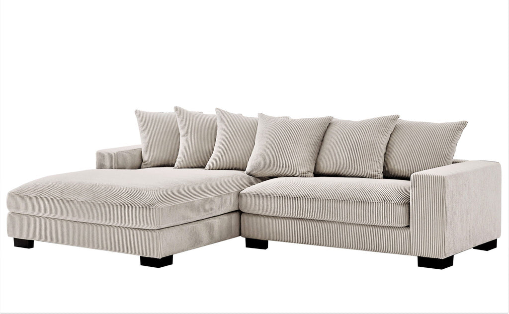L-shaped sectional sofa with chaise in light beige, soft cushions and back throw pillows