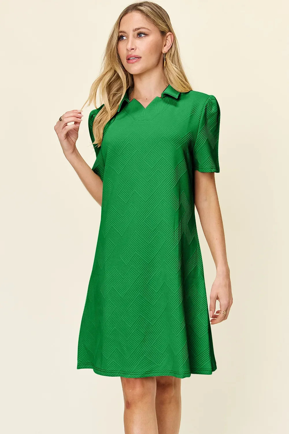 Green textured collared short-sleeve dress with buttoned collar, above-knee length