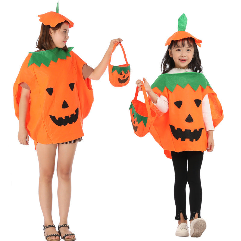 Two child pumpkin costumes: orange poncho with jack-o-lantern face and matching pumpkin tote bag