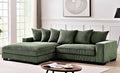 L-shaped sectional sofa with chaise, dark green, with tufted seat cushions and pillows