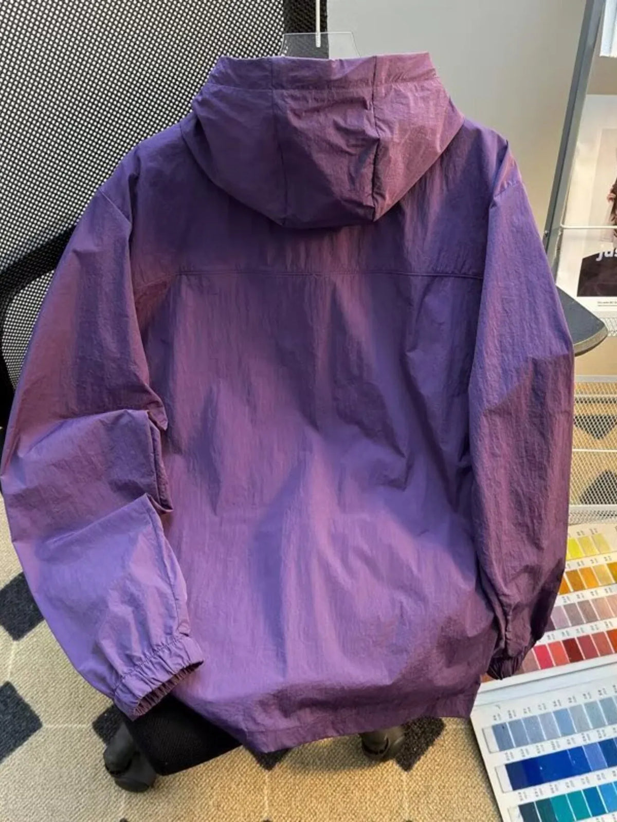 Lightweight hooded windbreaker jacket in purple with hood and elastic cuffs
