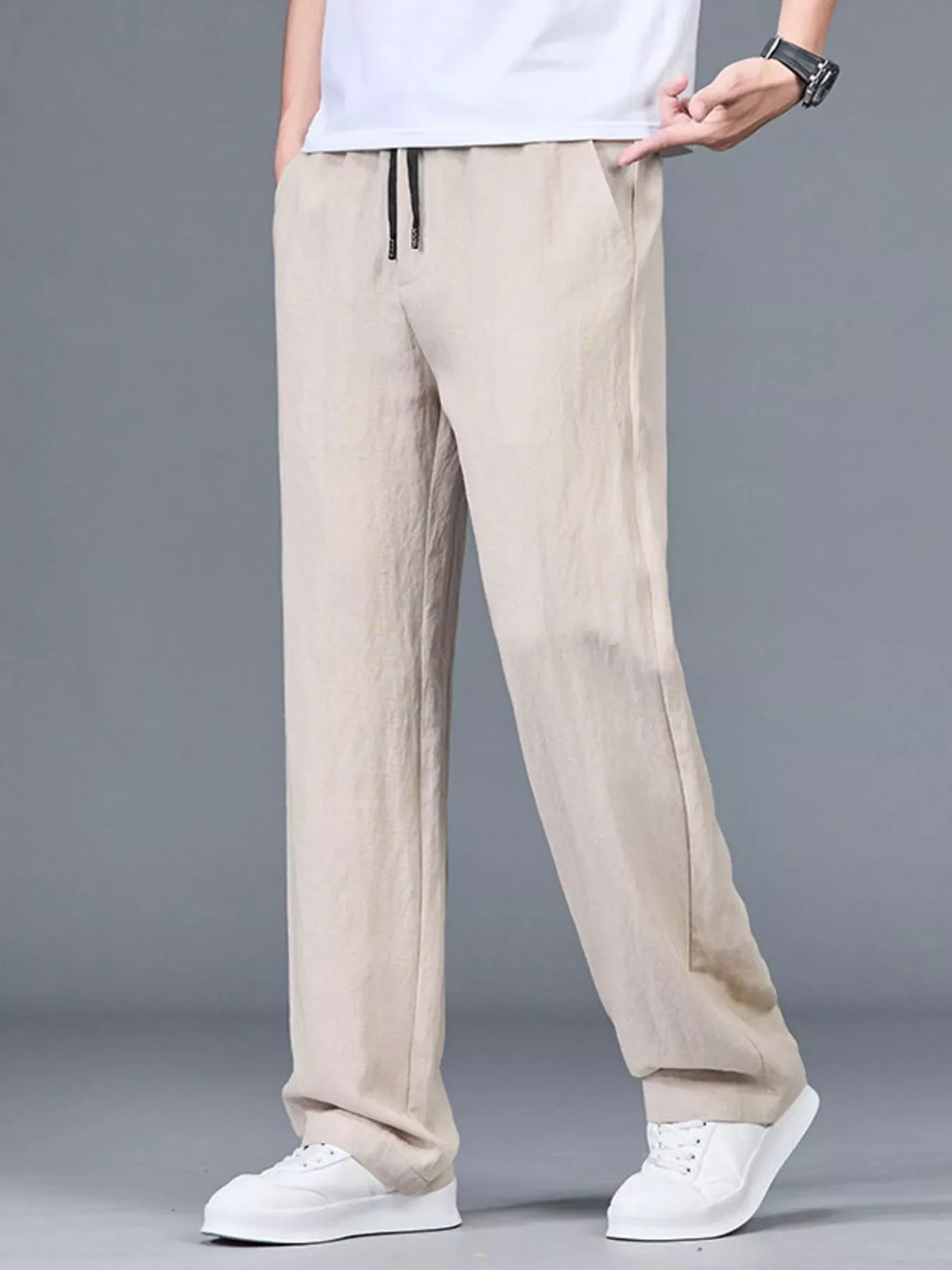 Lightweight casual pants in light beige with relaxed straight leg, elastic waist drawstring