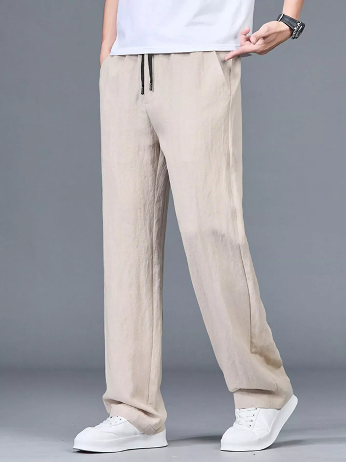Lightweight casual pants in light beige with relaxed straight leg, elastic waist drawstring