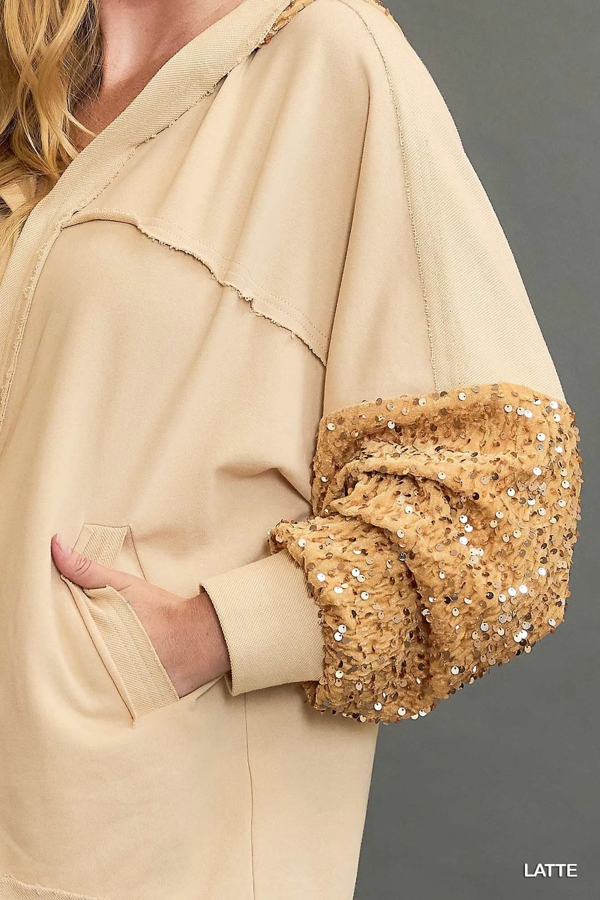 Latte sequin French terry hoodie jacket close-up, sequined hood edge and sleeve cuff