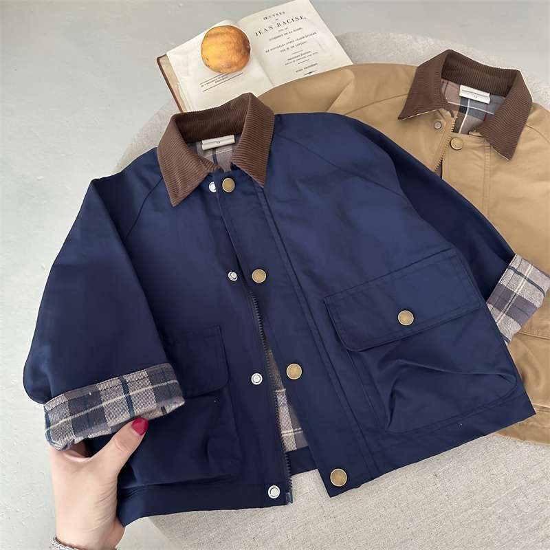 Navy blue patchwork jacket with plaid trim, button front, and brown collar