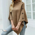 Khaki turtleneck poncho with asymmetrical hem and button-detail sleeves, one size