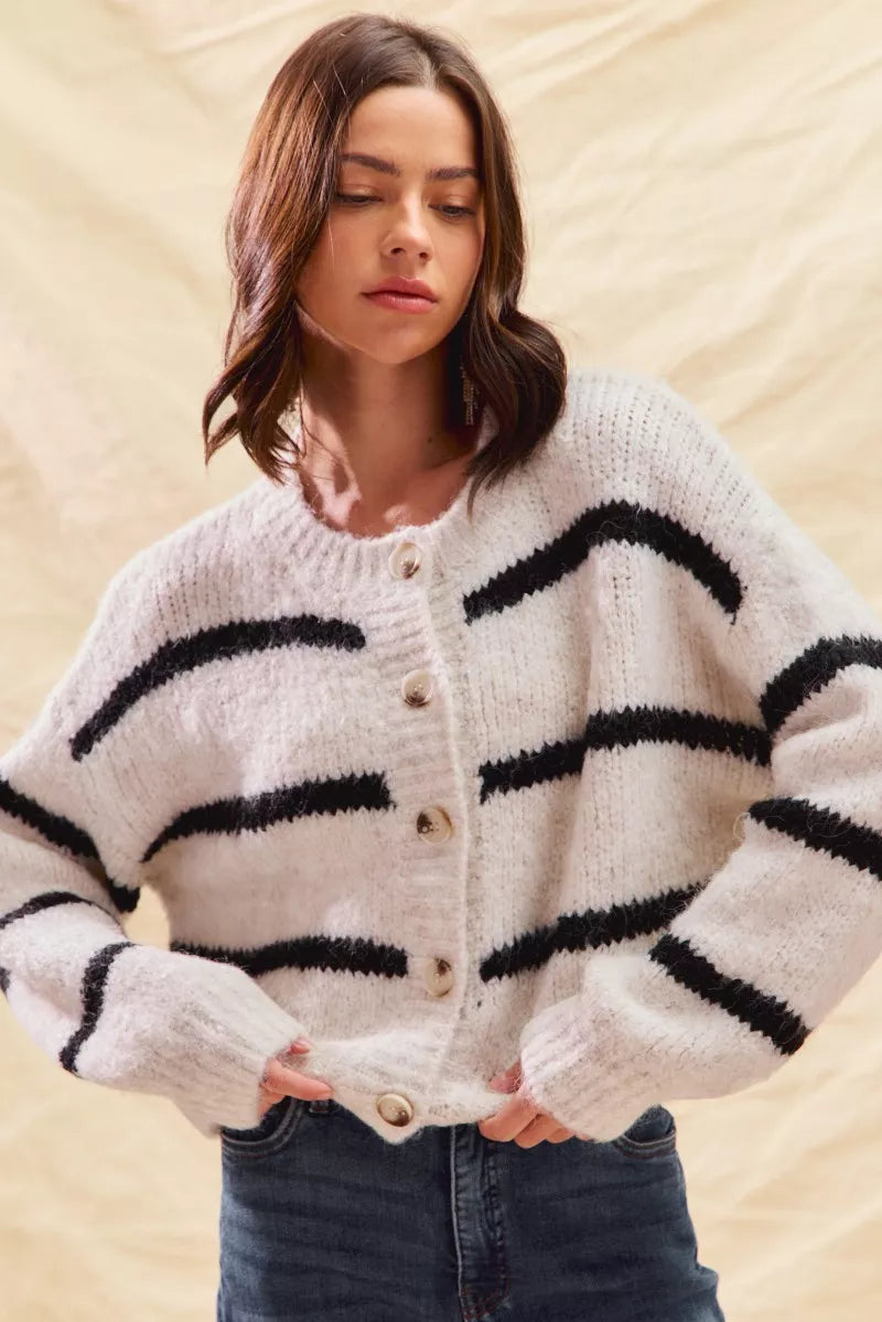 Striped button-front knit cardigan, cream body with black stripe bands and round buttons