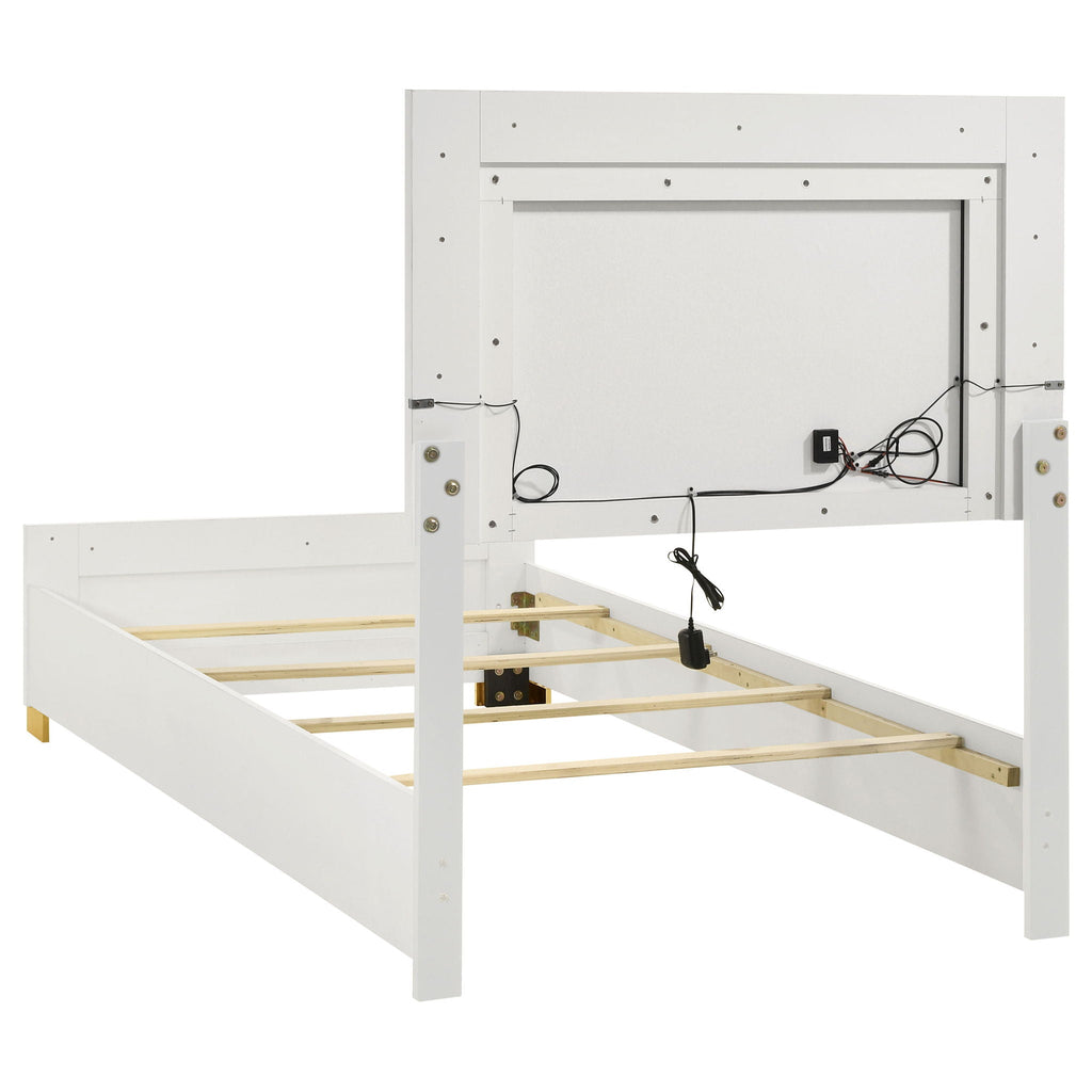 White twin bed frame with slat platform and control wiring under headboard