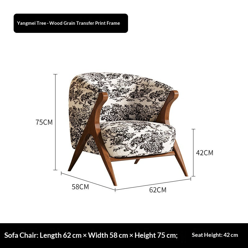 Black-and-white botanical printed lounge chair with wood frame, curved back and arms