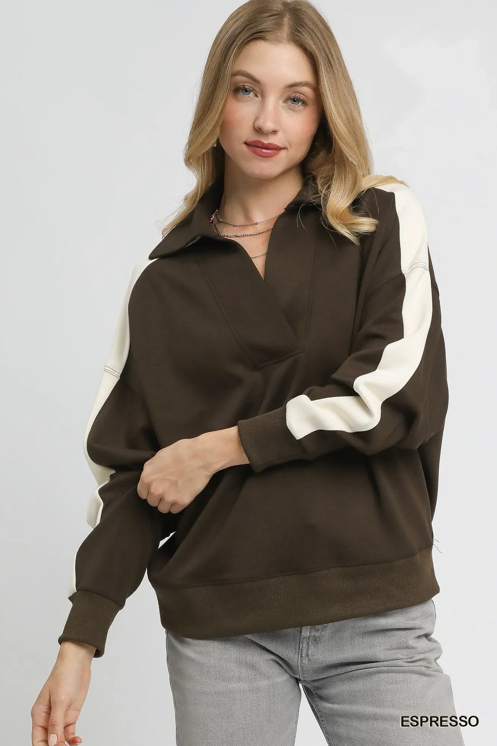 Color-block polo sweatshirt in dark brown with cream sleeves and buttoned placket