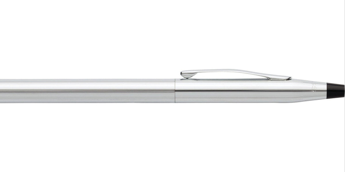 Chrome pen with curved clip and black grip, sleek barrel