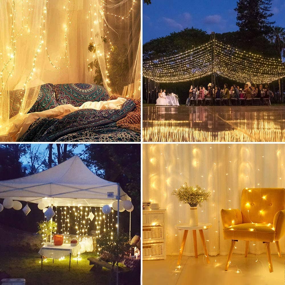 Warm white LED curtain lights with copper wire, hanging strand display