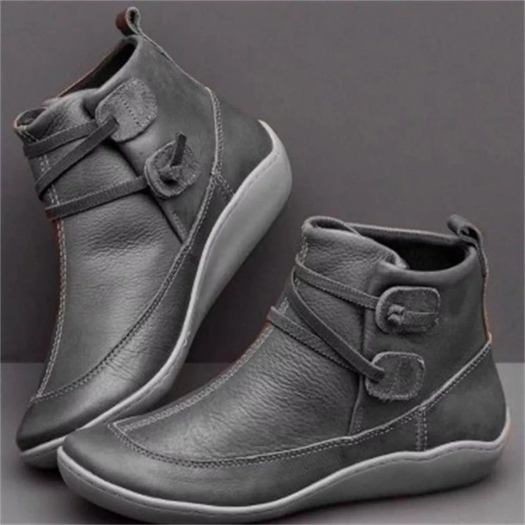 Charcoal lace-up ankle boots with button-detail strap and soft padded collar.