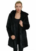 Women’s black faux fur hooded winter jacket, front view, buttonless open front.