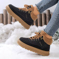 Black lace-up platform ankle boots with tan faux-fur lining and thick rubber sole